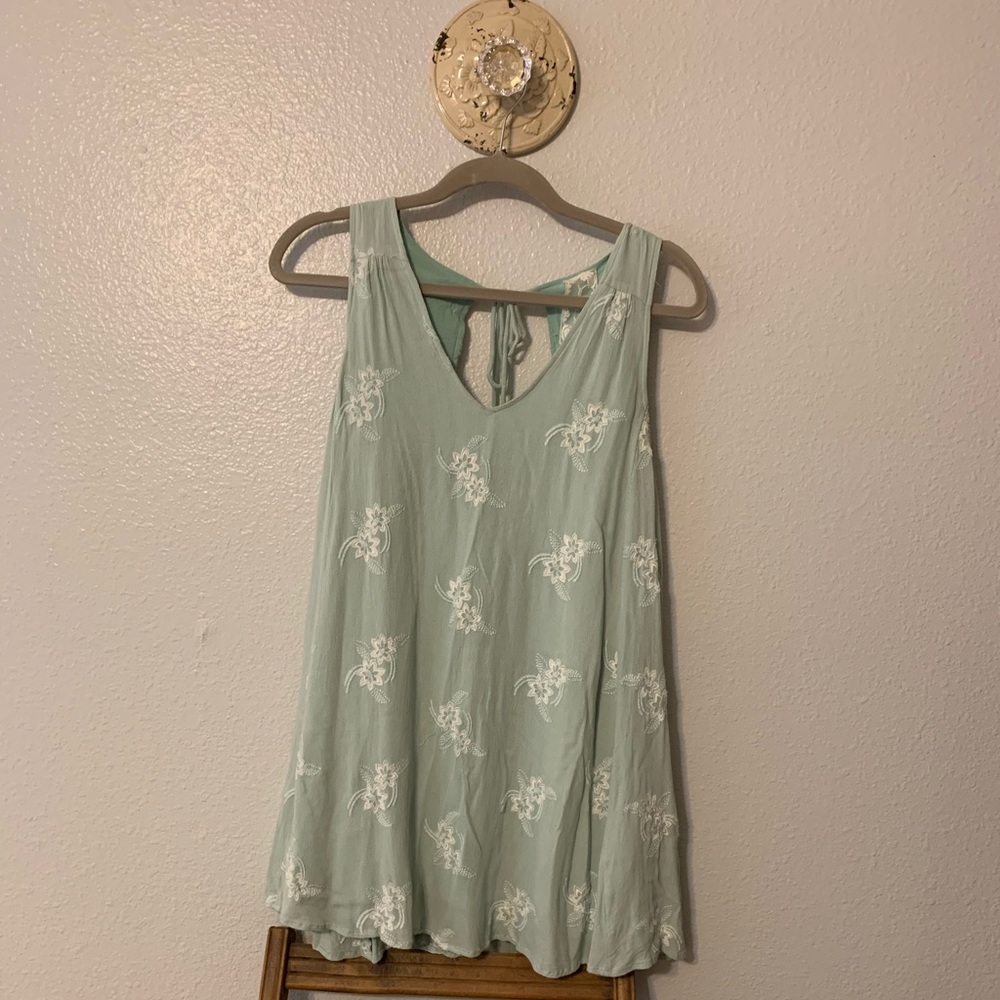 Cute little dress or a longer blouse.